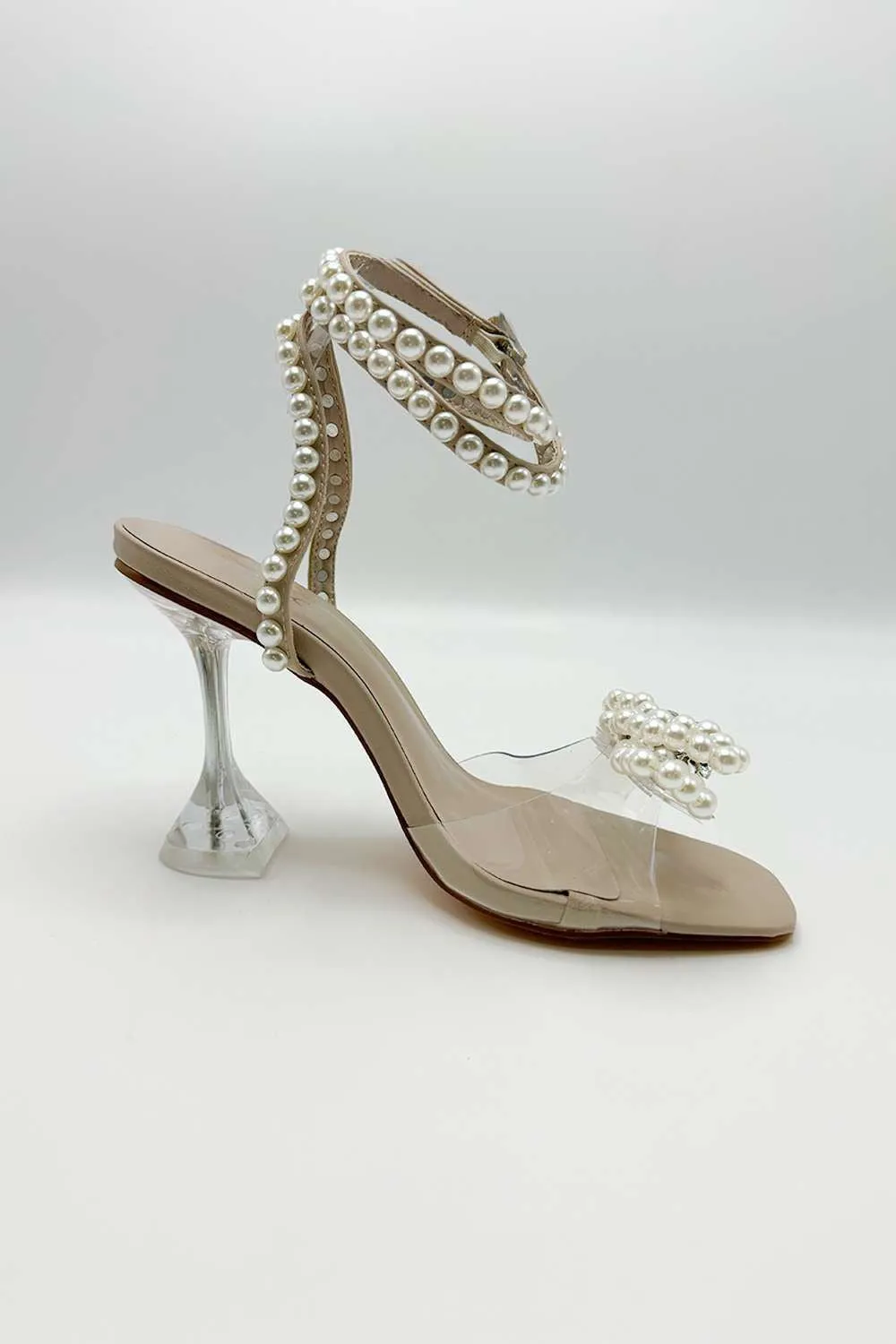 Pearlie Perspex Faux Pearl Bow Detail Heeled Sandals in Nude