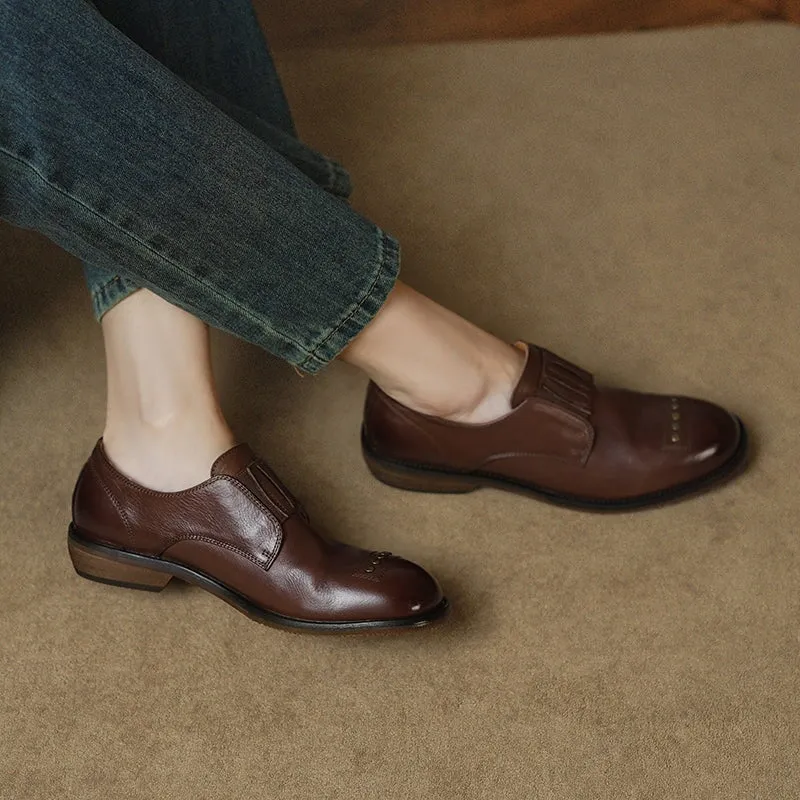 Retro Cowhide Round Toe Rivet Decorated Low Heel Loafers in Black/Brown